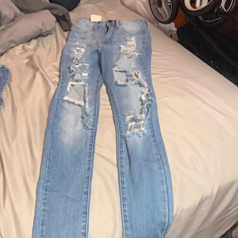 ripped blue jeans size 1(25)